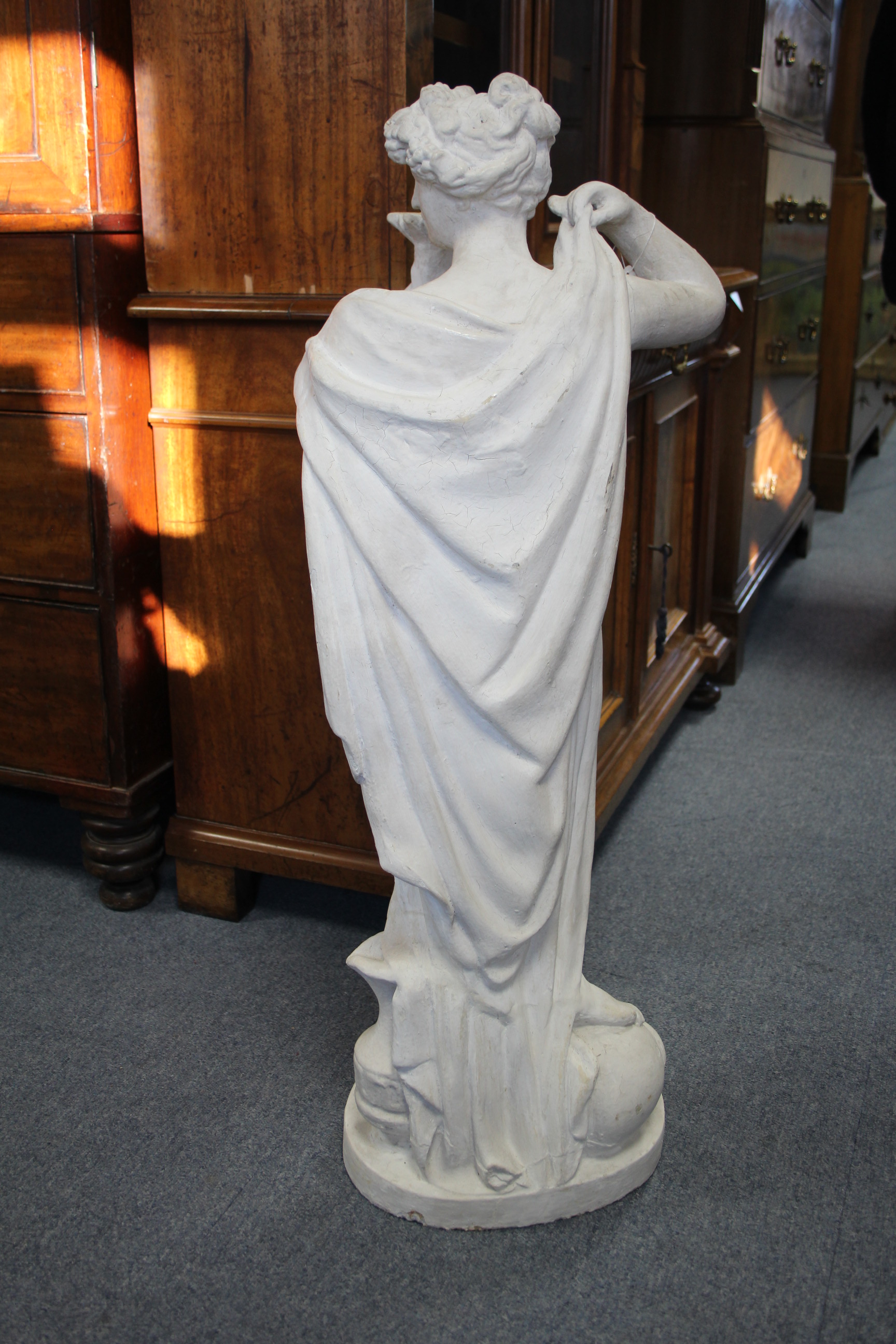 A white-painted plaster standing classical female figure with flowing robes, a candle holder to - Image 3 of 6