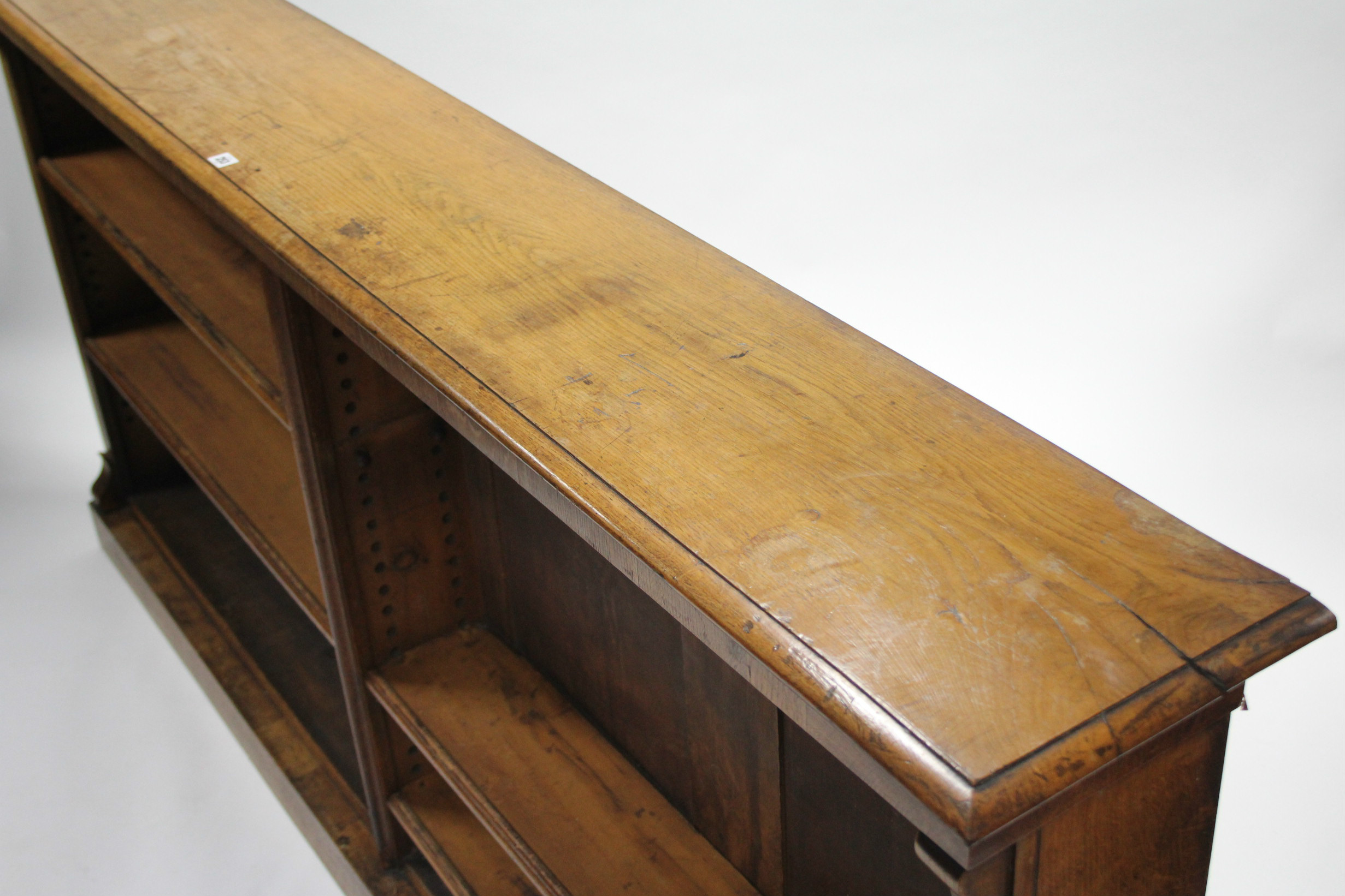 An early 19th century light oak standing open bookcase, having four adjustable shelves, plain scroll - Image 2 of 4