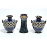 A pair of Doulton Lambeth stoneware amphora-shaped vases of deep blue ground with raised &