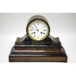 A mid-19th century French mantel clock in burr-walnut drum case, on rectangular base with ebonised