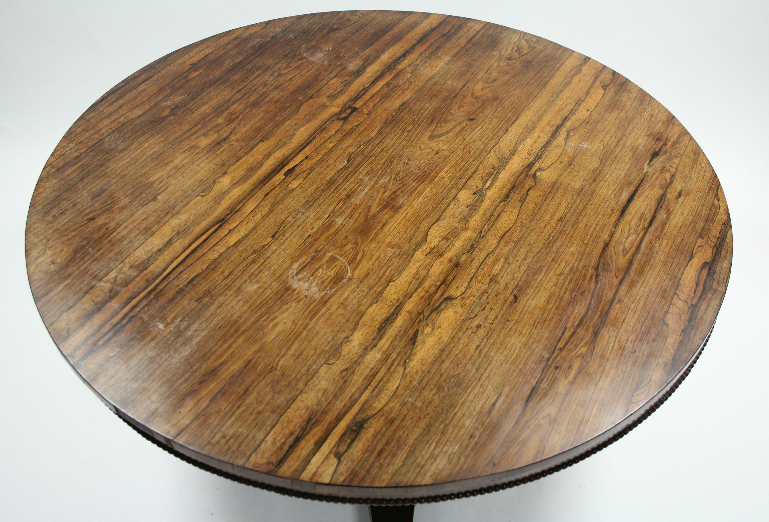 A GEORGE IV ROSEWOOD CENTRE TABLE, the circular top with beaded lower rim, on triform centre column& - Image 2 of 4