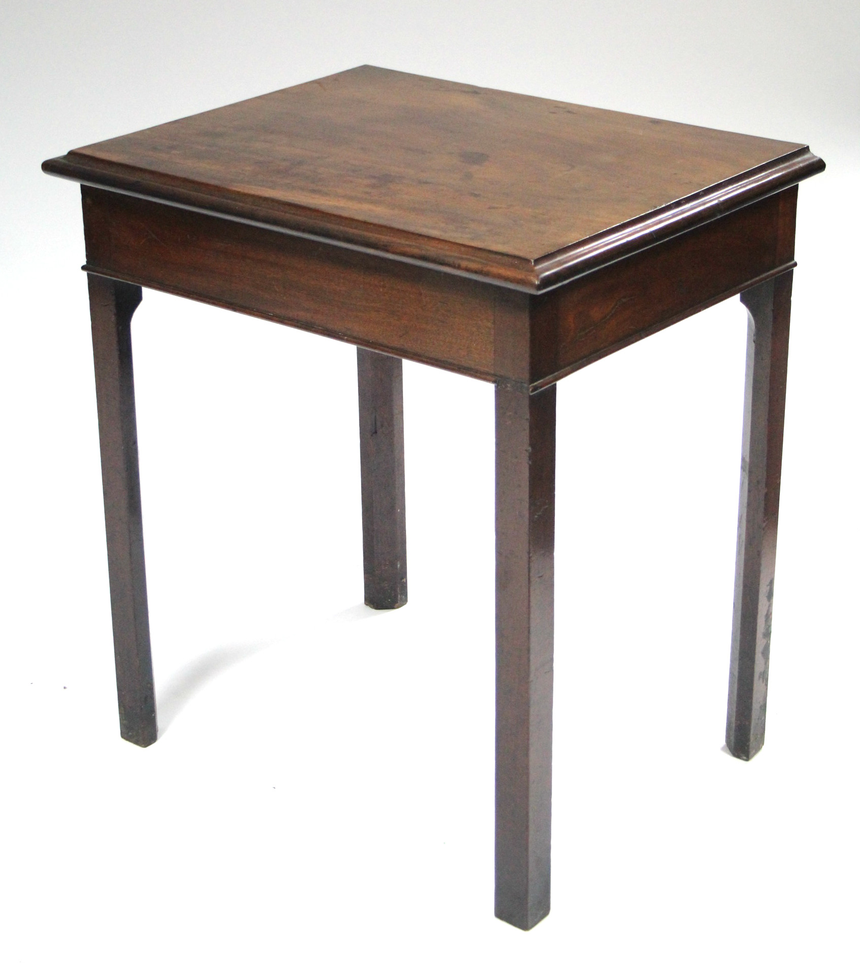 A Georgian mahogany hall table, of plain form, the rectangular top on square chamfered legs; 27”