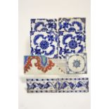 An Iznik polychrome corner border tile, 10" x 4¾" (re-stuck); four continental blue-&-white tin