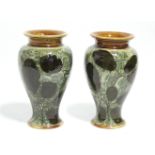 A pair of Royal Doulton stoneware round tapered vases decorated with the "Autumn Leaf" pattern;