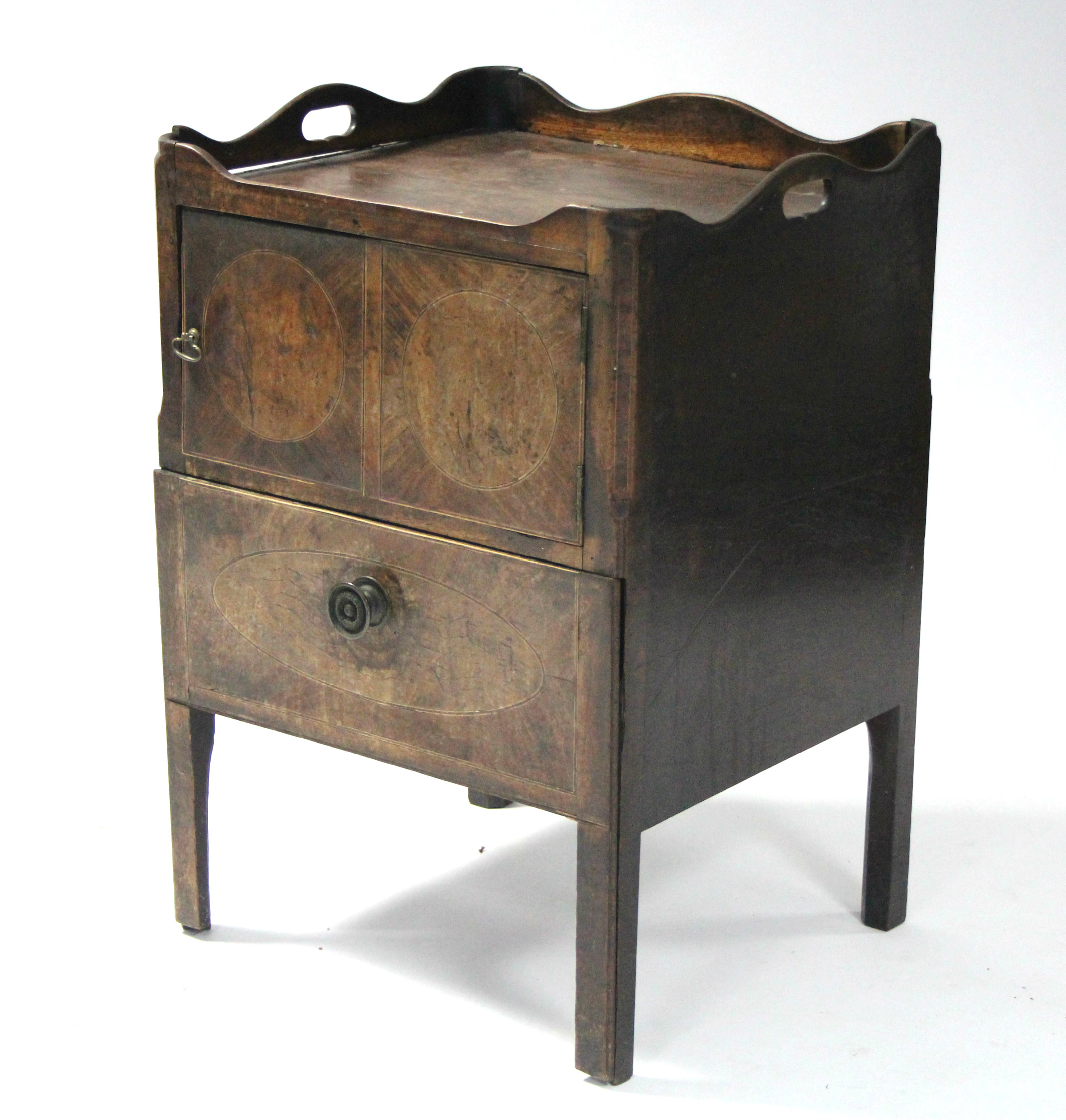 A late 18th century inlaid-mahogany tray-top commode fitted small cupboard enclosed by a panel door,