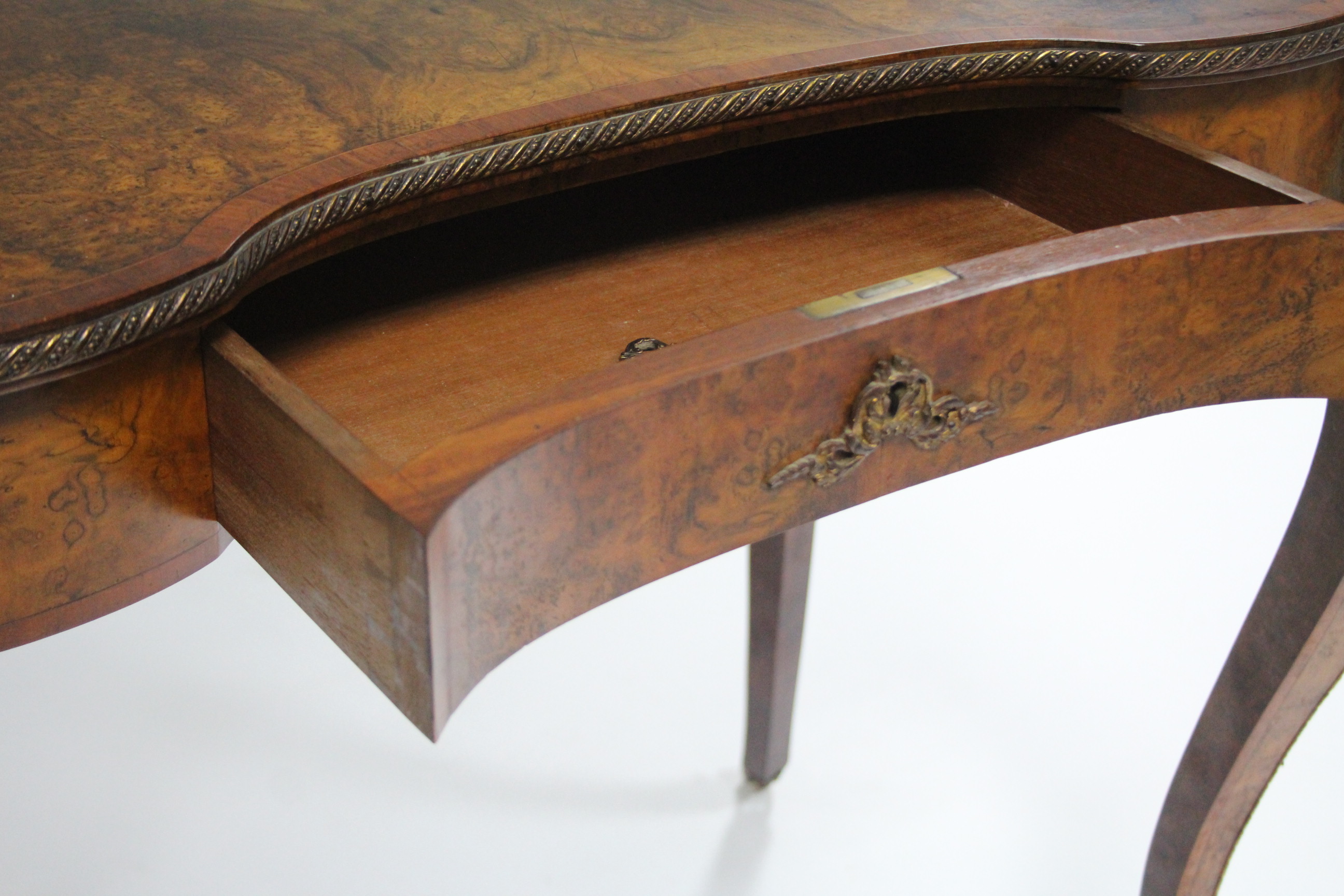 A mid-19th century burr-walnut kidney-shaped dressing table in the Louis XVI style, the - Image 6 of 10