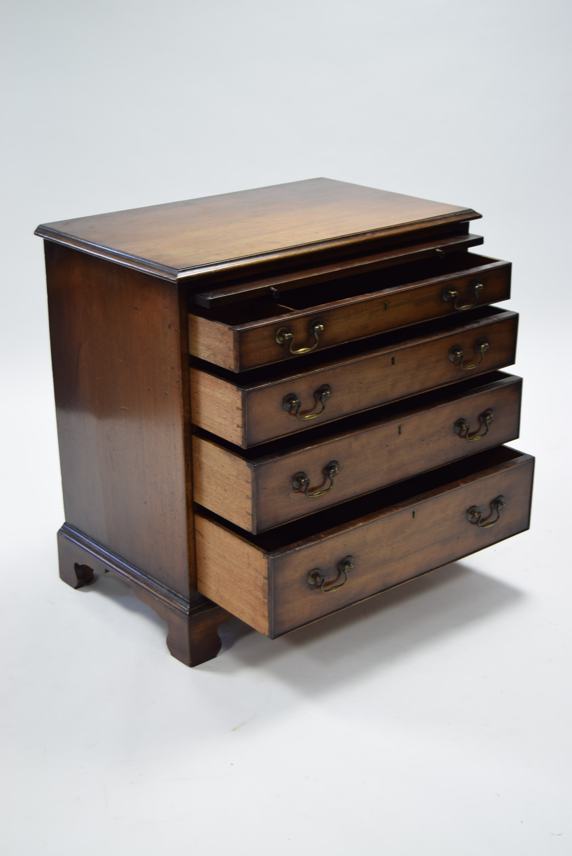 An early Victorian mahogany chest of four long graduated drawers with original brass swan-neck - Image 2 of 2