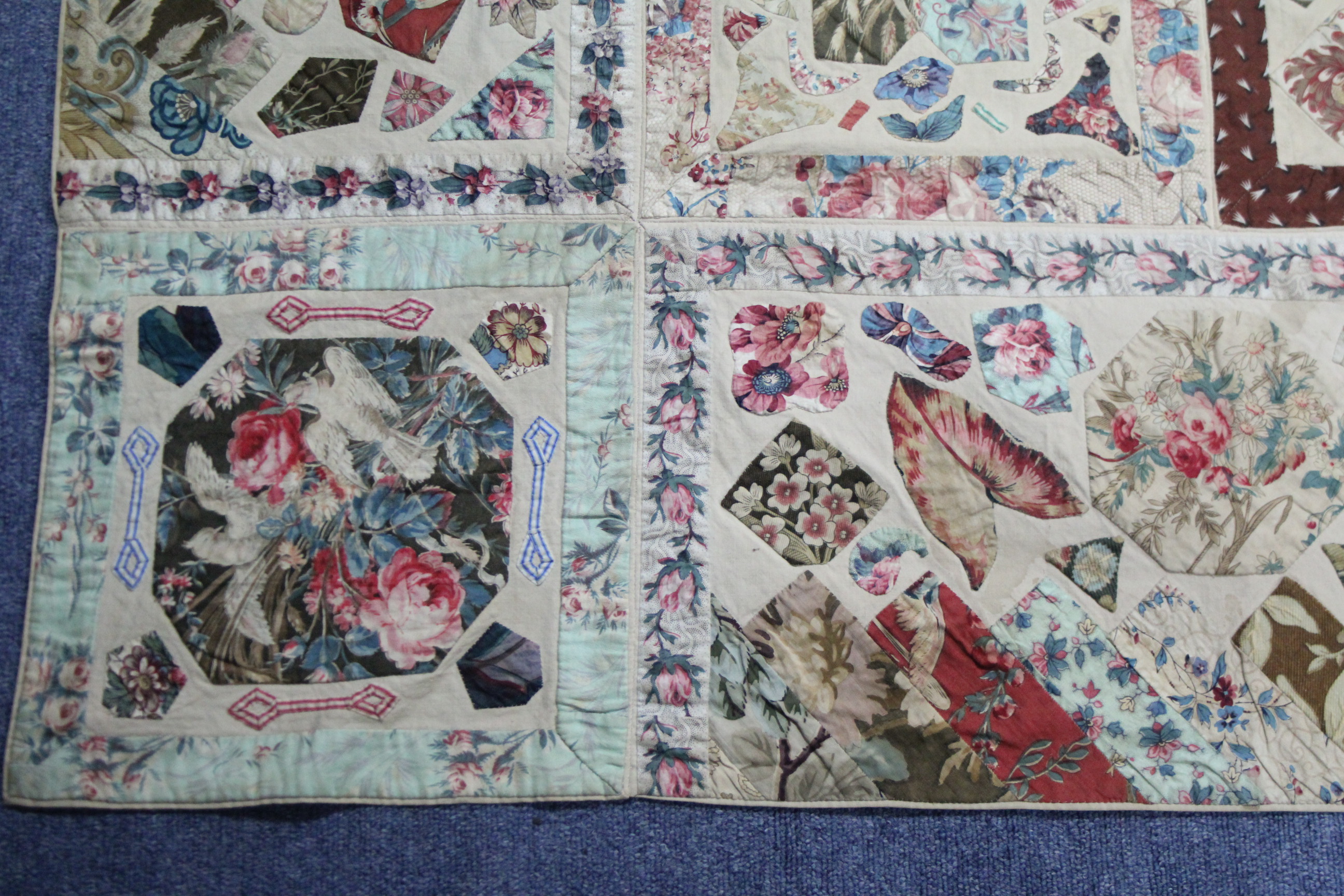 A VICTORIAN PATCHWORK BEDSPREAD or WALL HANGING comprising a wide variety of printed fabrics cut - Image 3 of 5