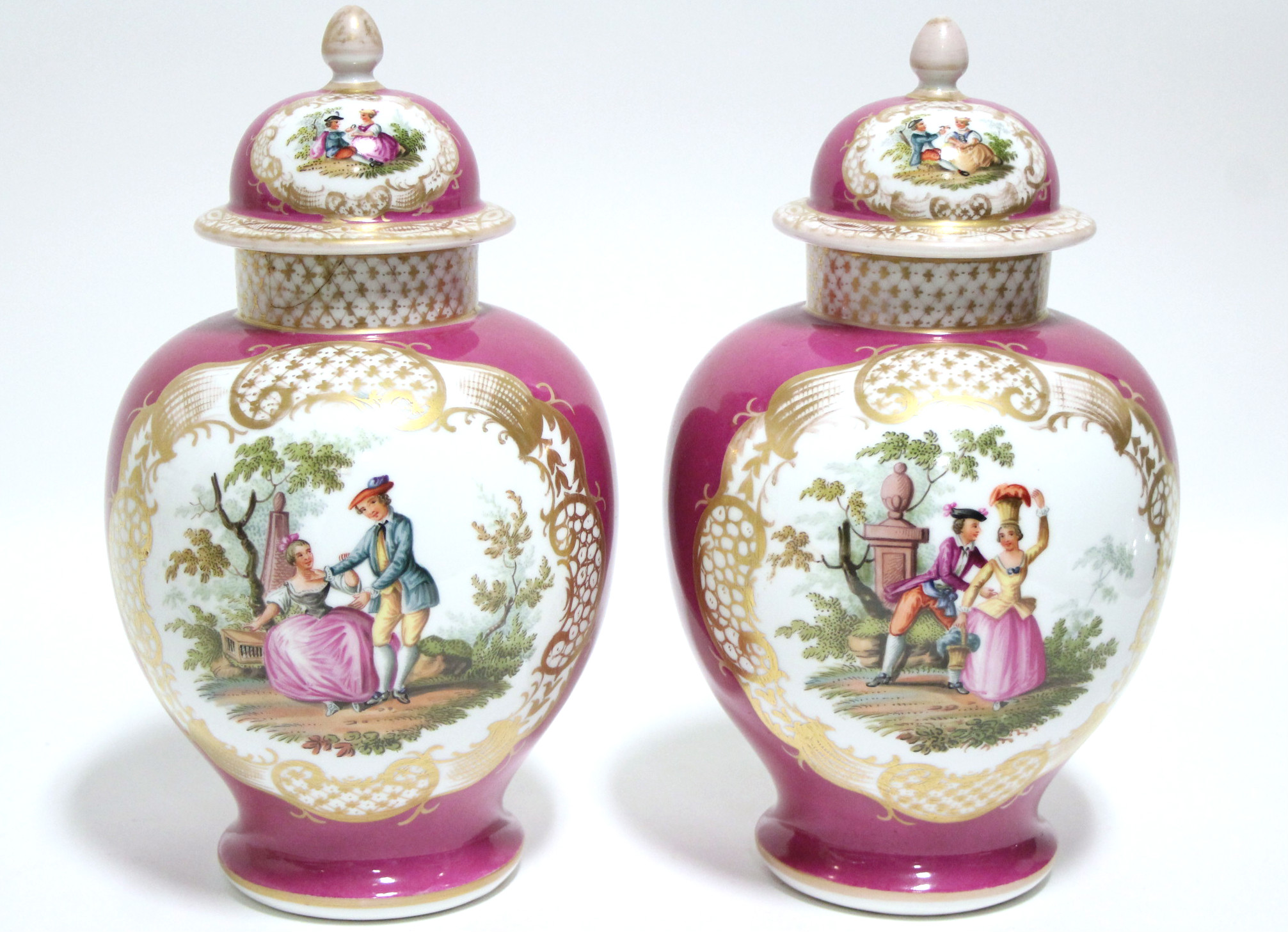 A pair of Helena Wolfsohn porcelain baluster vases & covers in the Meissen style, puce ground with