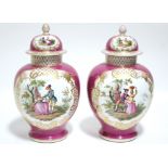 A pair of Helena Wolfsohn porcelain baluster vases & covers in the Meissen style, puce ground with