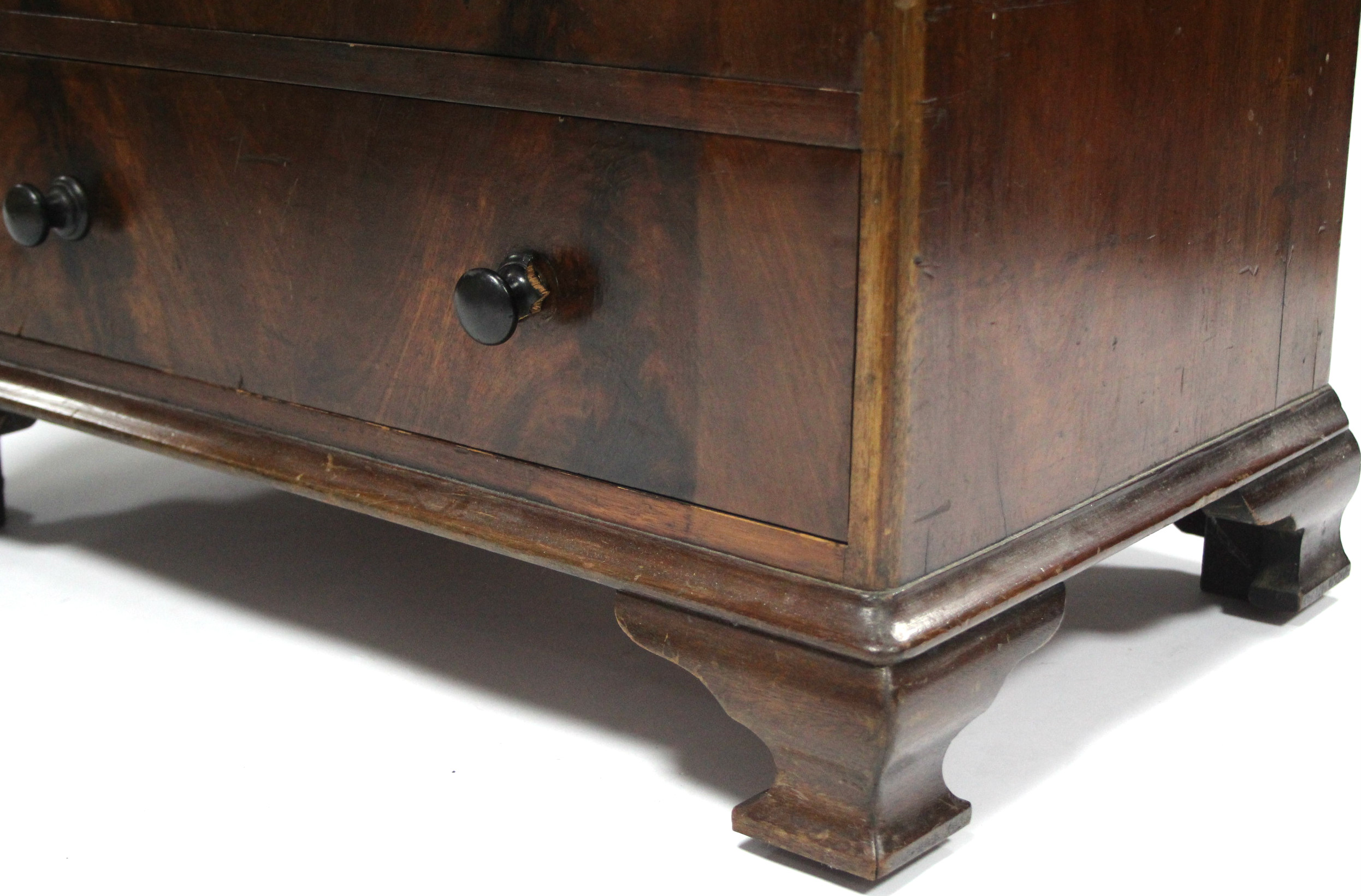 A mid-Victorian mahogany chest of six long graduated drawers with turned knob handles, the top - Image 4 of 10
