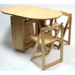 A maple-finish drop-leaf kitchen table, 33½" x 52"; & a ditto set of four fold-away kitchen chairs