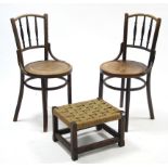 A pair of bentwood spindle-back café chairs with circular hard seats &on round tapered legs; & an