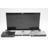 A Panasonic 43" LCD television; a ditto Blue-Ray disc player/HDD recorder, each with remote control;