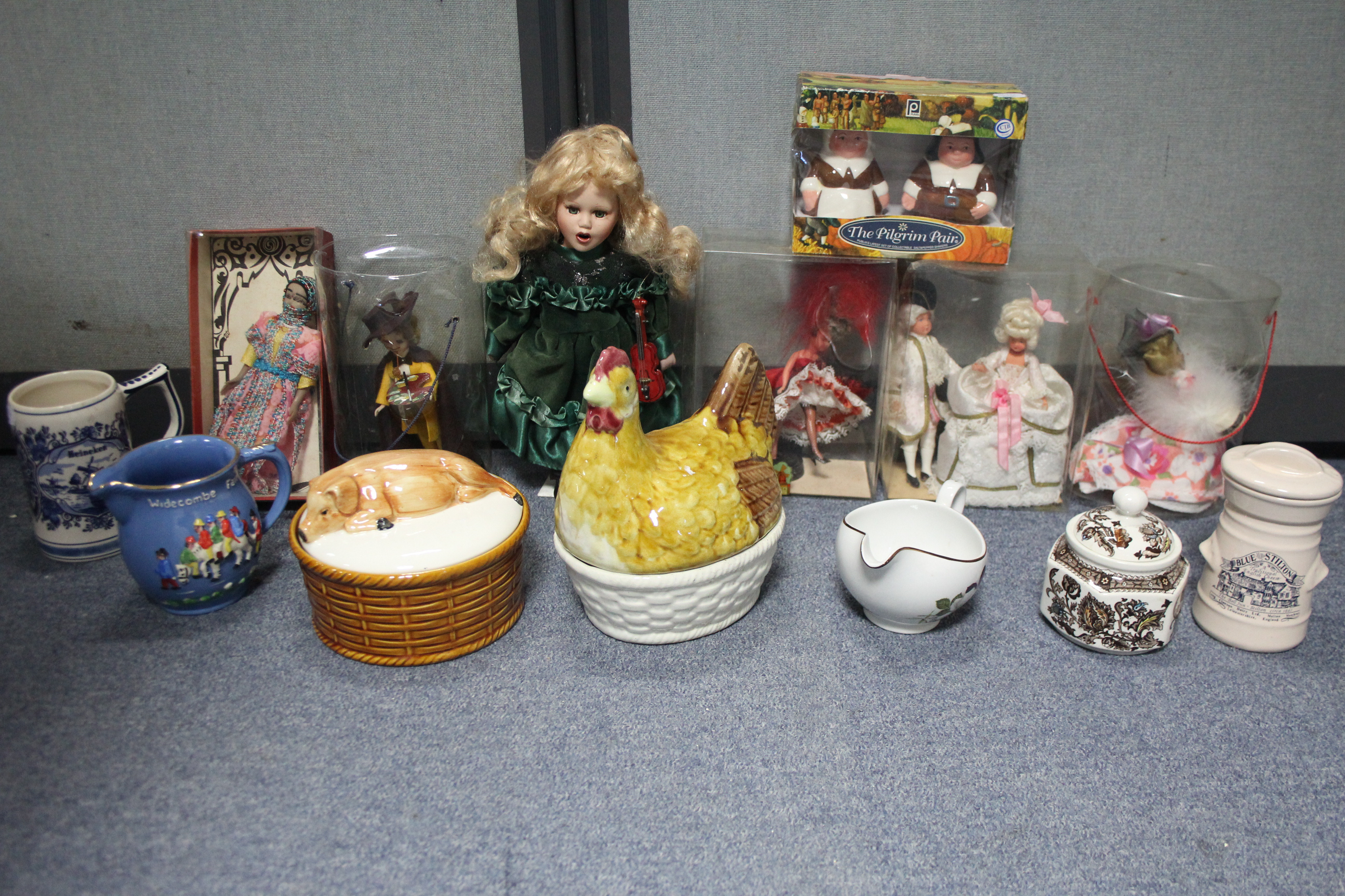 Seven costume dolls; & various decorative ornaments.