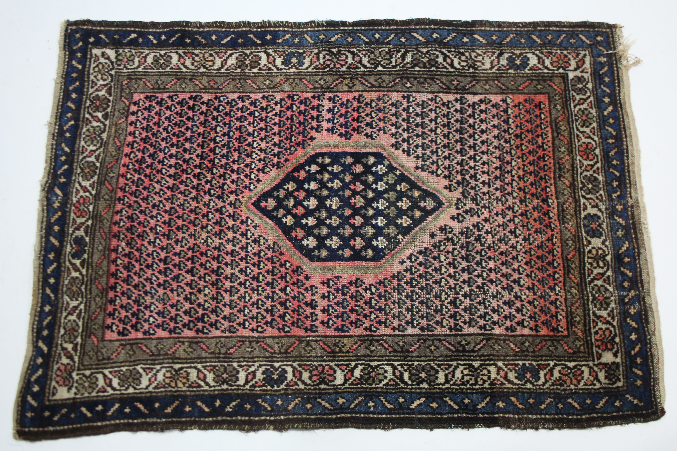 A Persian pattern rug of crimson & ivory ground & with all-over repeating multi-coloured geometric - Image 3 of 4