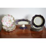 A Hammersley porcelain nine piece part dessert service with blue & gold foliate borders & with white
