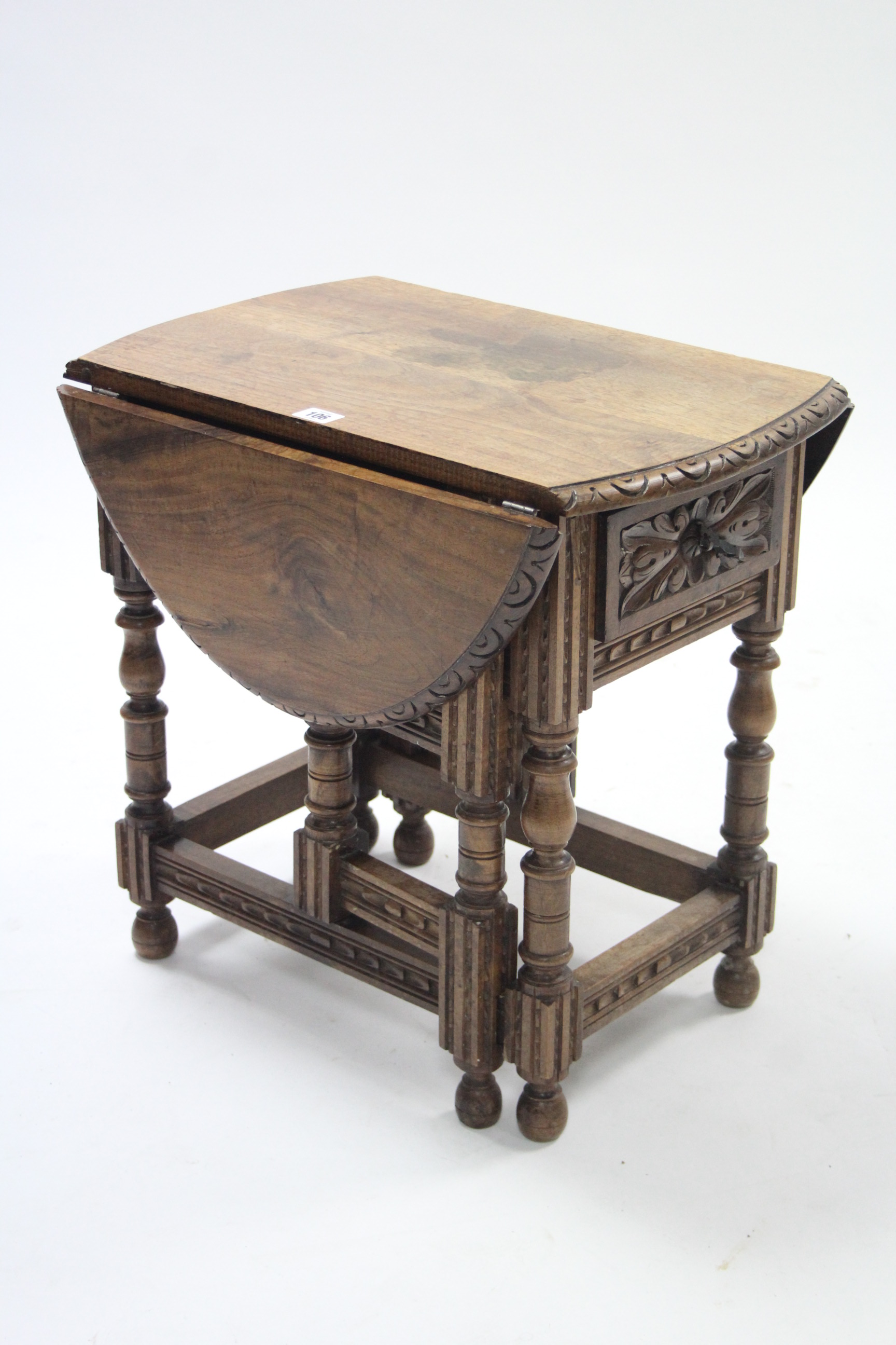 A similar oval gate-leg occasional table fitted end drawer & on turned legs & turned feet with