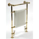 A Myson brass-finish & white enamelled master suite Hydronic towel warmer 25” wide x 36¾” high.