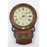 A Victorian inlaid walnut drop-dial wall clock, the 12” diam. painted dial inscribed: “F. Tovey,
