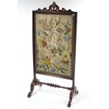 A Victorian large gold painted & natural mahogany frame firescreen inset floral panel, & on short