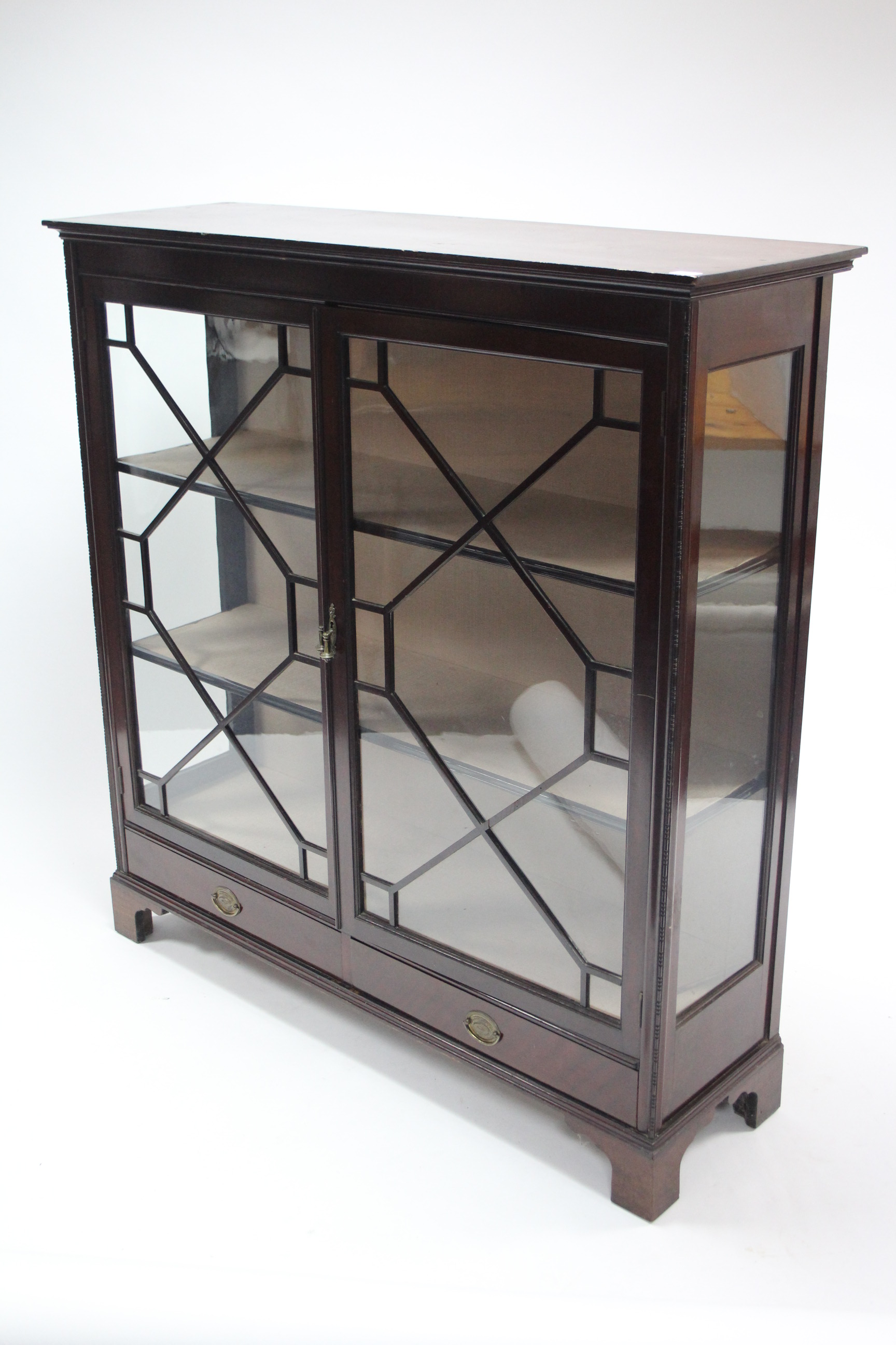 A late 19th/early 20th century mahogany china display cabinet, fitted two shelves enclosed by pair