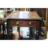 A Victorian mahogany drop-leaf table fitted end drawer & on turned tapered legs with brass