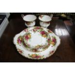 A Royal Albert “Old Country Roses” pattern twenty-one piece tea service, boxed.