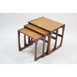 A G-Plan teak nest of three rectangular occasional tables.