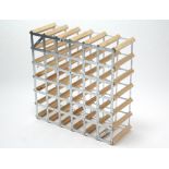 A pine and aluminium thirty-six division wine rack. 24" square.