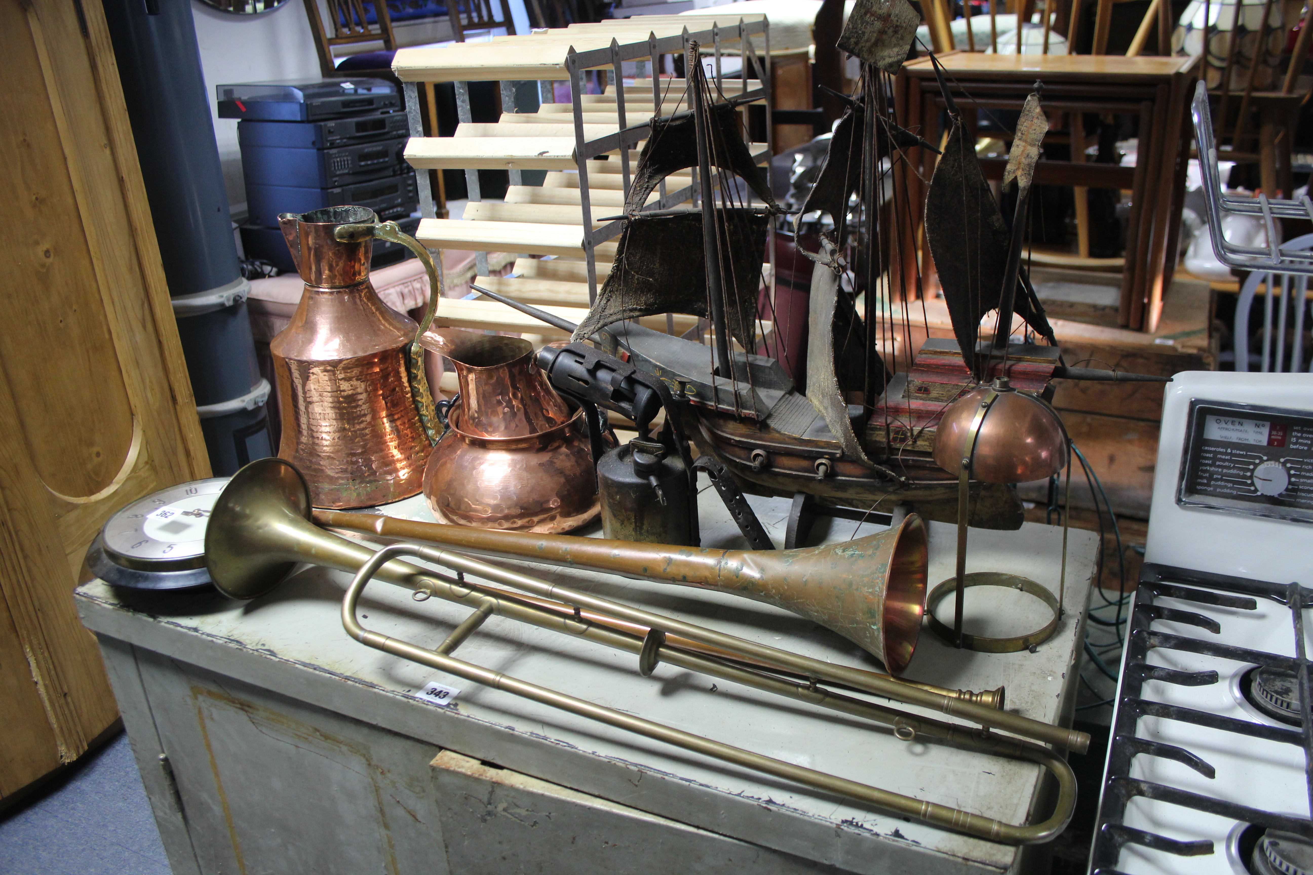 A painted wooden galleon; & various items of metalware.