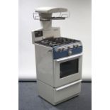 A 1960’s Parkinson Cowan “Prince Two” gas cooker in white & blue finish case.