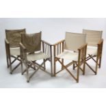 Two pairs of beech fold-away director’s chairs.