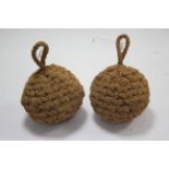 Two modern 12" diam. coir ball fenders.