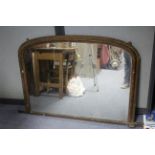 A Victorian gilt-framed overmantel mirror with rounded top, 43” wide x 33” high; & a rectangular