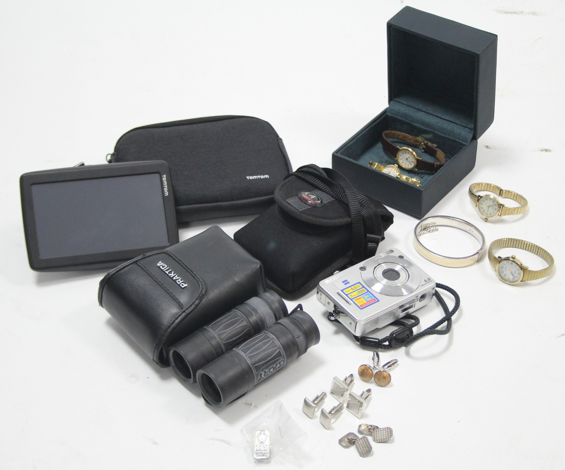 A Tom-Tom SatNav; two modern cameras; four ladies' wristwatches; & a plated hinged bracelet, etc.