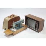 An Alfa hand sewing machine with case; & a Sony Triniton vintage colour television.