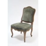 A continental beech frame occasional chair with padded seat & back upholstered pale green
