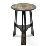 An Edwardian poker-work occasional table with circular top& on pierced legs with shaped undertier,
