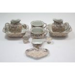 A Doulton Burslem floral decorated six-piece toilet set (pattern No. 7447); & a ditto four-piece