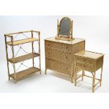 A rattan small chest fitted three long graduated drawers, 27” wide; a ditto bedside table & dressing