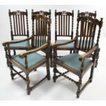 A set of six 1930’s oak dining chairs (including a pair of carvers) with carved & pierced rail