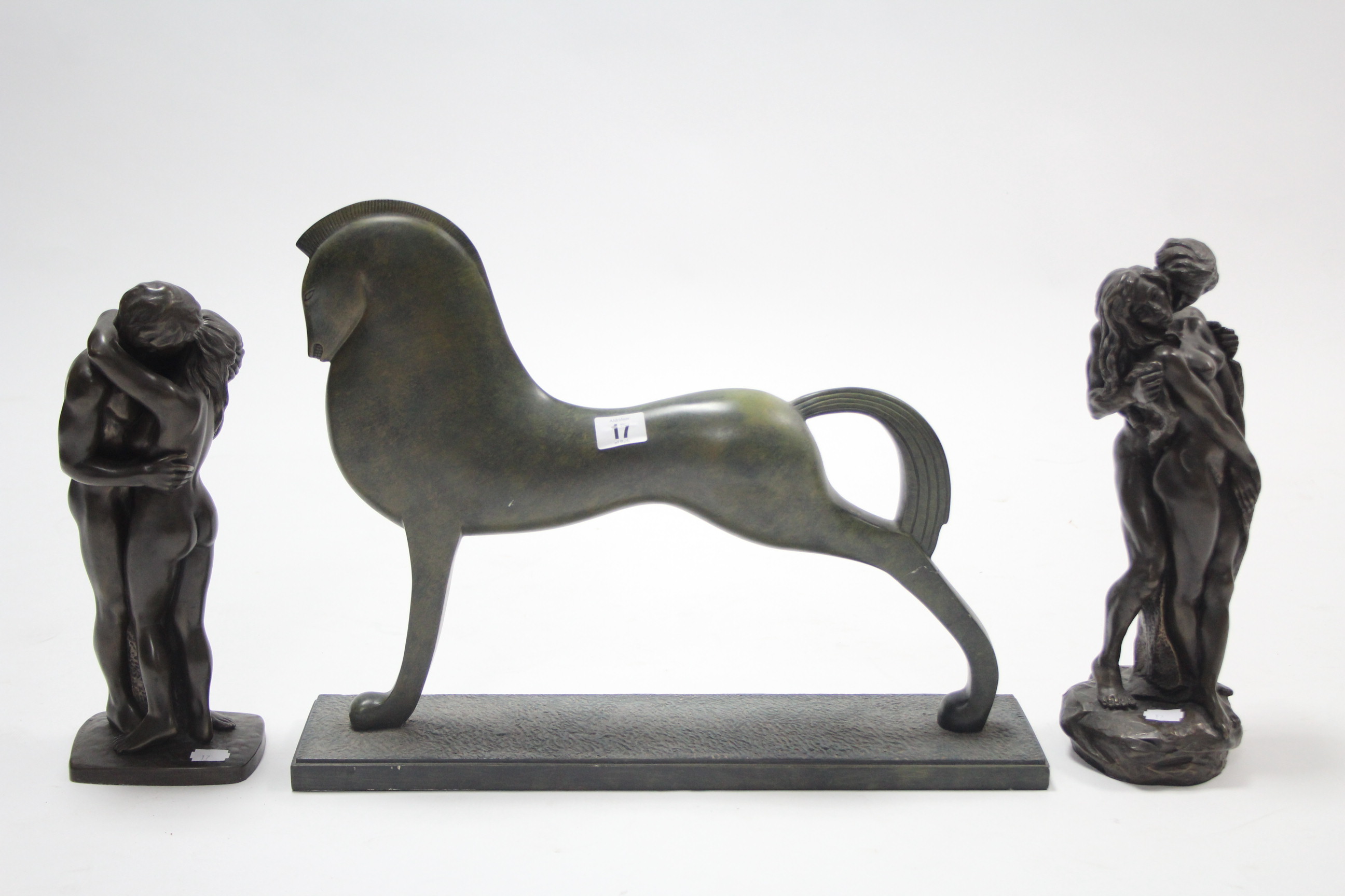 An Artforum bronzed sculpture "Contemporary Horse", 15" high; two Heredities bronzed figure