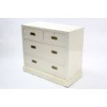 A late Victorian cream painted walnut chest fitted two short & two long drawers with brass flush
