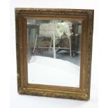 A large gilt gesso frame rectangular wall mirror, slight faults, 39" x 32¾".