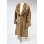 A musquash fur coat; & two other fur coats.