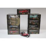 Ten Burago large die-cast scale model cars, nine with window boxes.