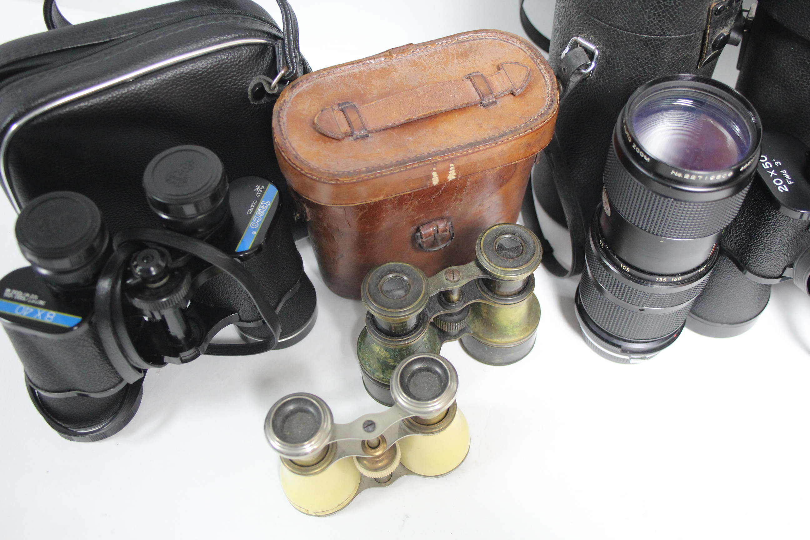 A Vivitar zoom lens; three pairs of binoculars; a pair of field glasses; & a pair of opera glasses. - Image 3 of 3