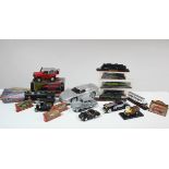 Approximately forty various scale model cars & trains, boxed & un-boxed.