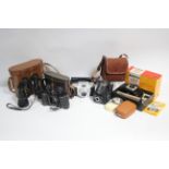 A pair of Barr & Stroud binoculars (CF43), complete with leather case, with receipt; a pair of